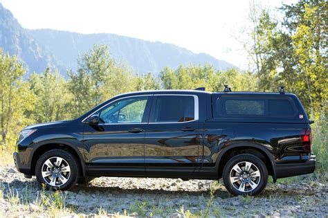 The Ridgeline dominates on and off the road with an i-VTM4 AWD system, a 280-horsepower V-6 engine capable of towing up to 5,000 pounds, and a scratch-resistant truck bed for all your gear. . Honda ridgeline topper